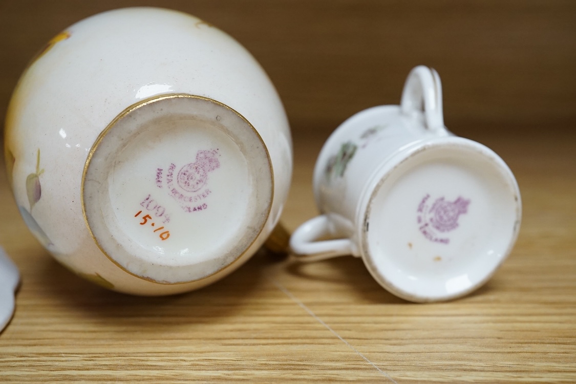 Three pieces of Worcester comprising a fruit printed and painted dish, bears signature Freeman, floral jug and a miniature tyg hand painted with a bird, largest 24cm in diameter
